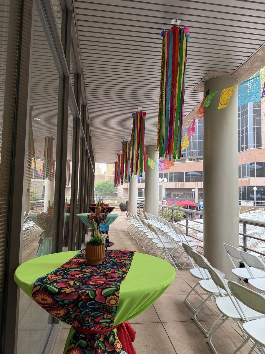 Large balloon garland installation for IBC Bank event in San Antonio TX